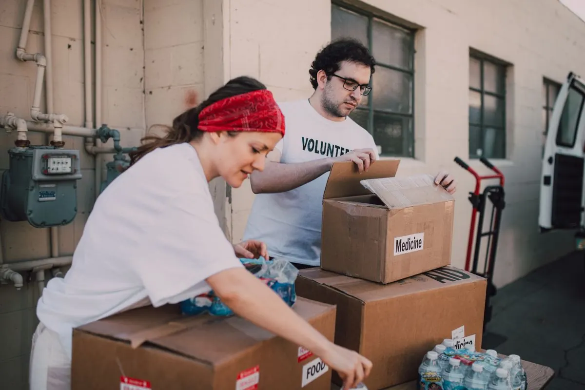 Volunteers packing donation boxes